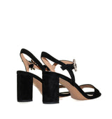 Sandalia con hebilla de cristal en ante negro