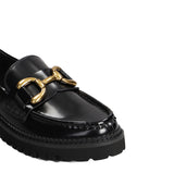 Mocasín piso track en negro