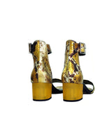 Sandalia en grabado serpiente amarillo.