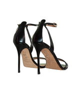 Vista desde atrás Tacón alto forrado – sandalia de piel Durá & Durá
Detalle de la pulsera Detalle de pulsera al tobillo en piel negro