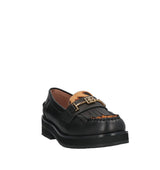 TINA Mocasín track con flecos combi negro