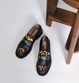 TINA Mocasín track con flecos combi negro