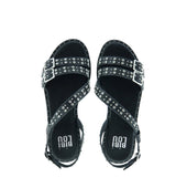 Sandalia baja "S" con tachas en negro