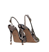 Stiletto alto destalonado en serpiente